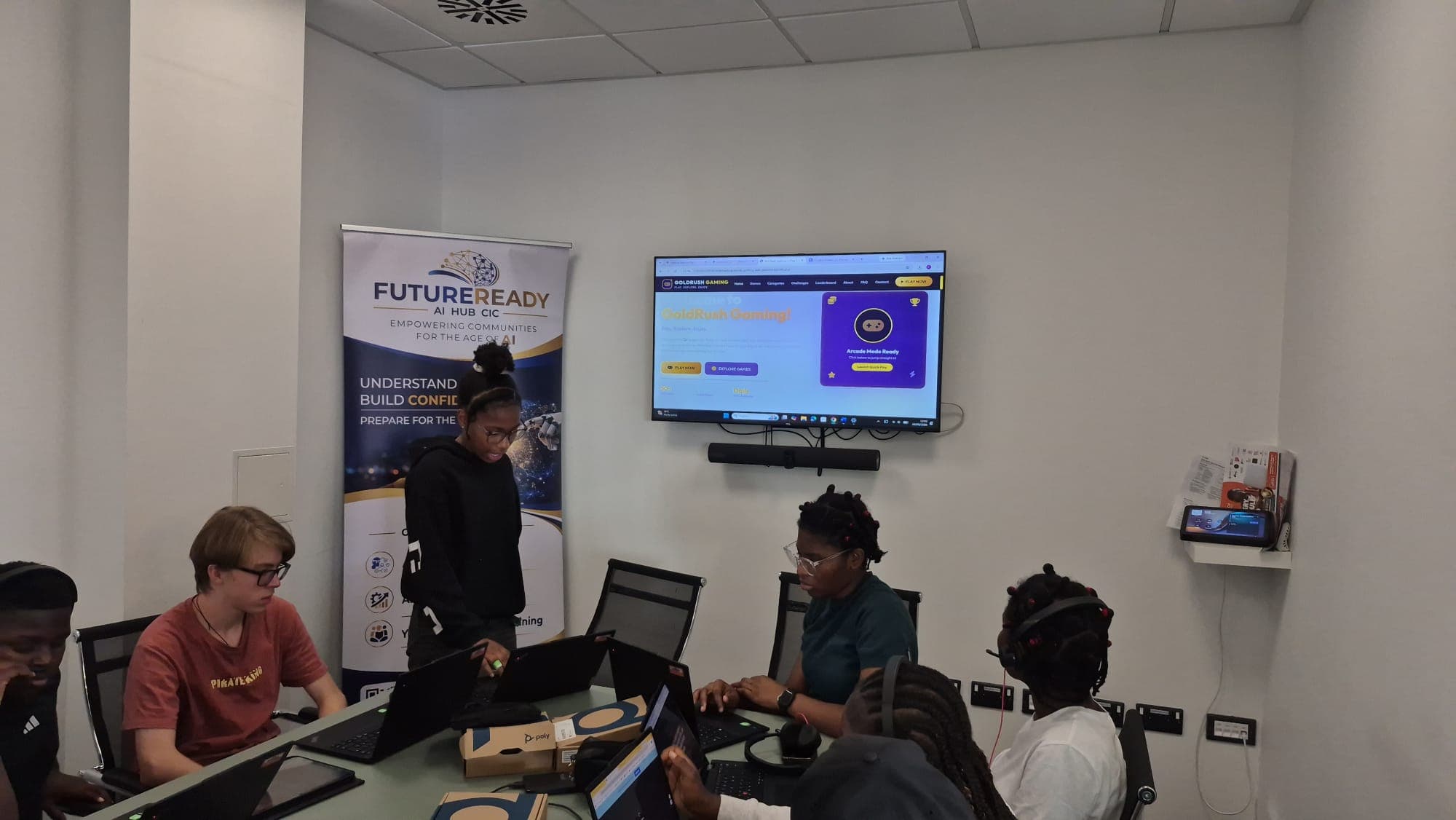 A participant showing the gaming website she created during the workshop