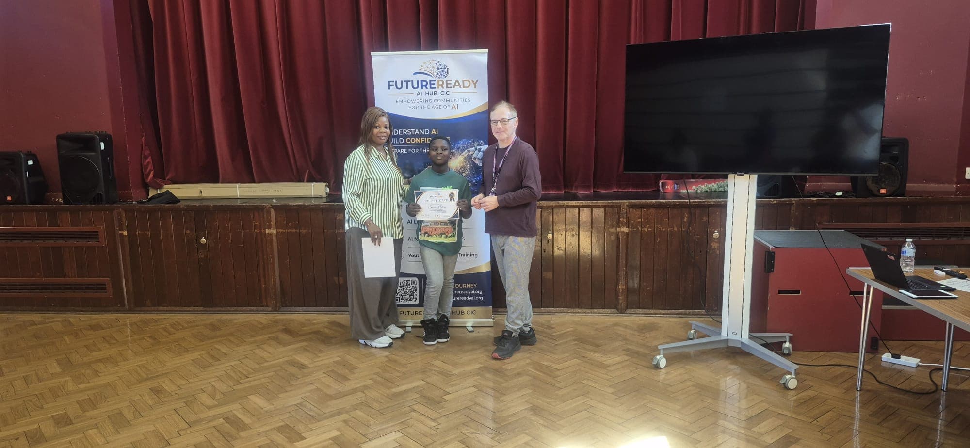 A participant receiving their certificate at the end of the FutureReady summer programme