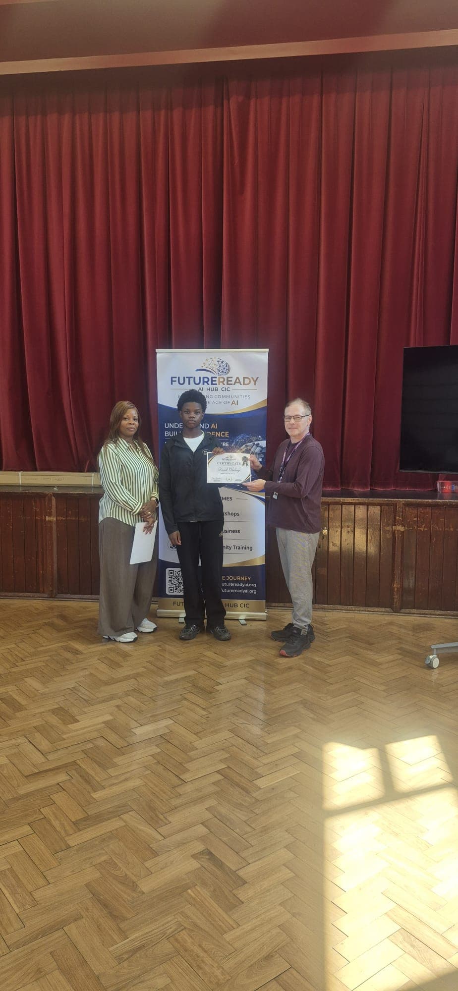 A participant receiving their certificate at the end of the FutureReady summer programme