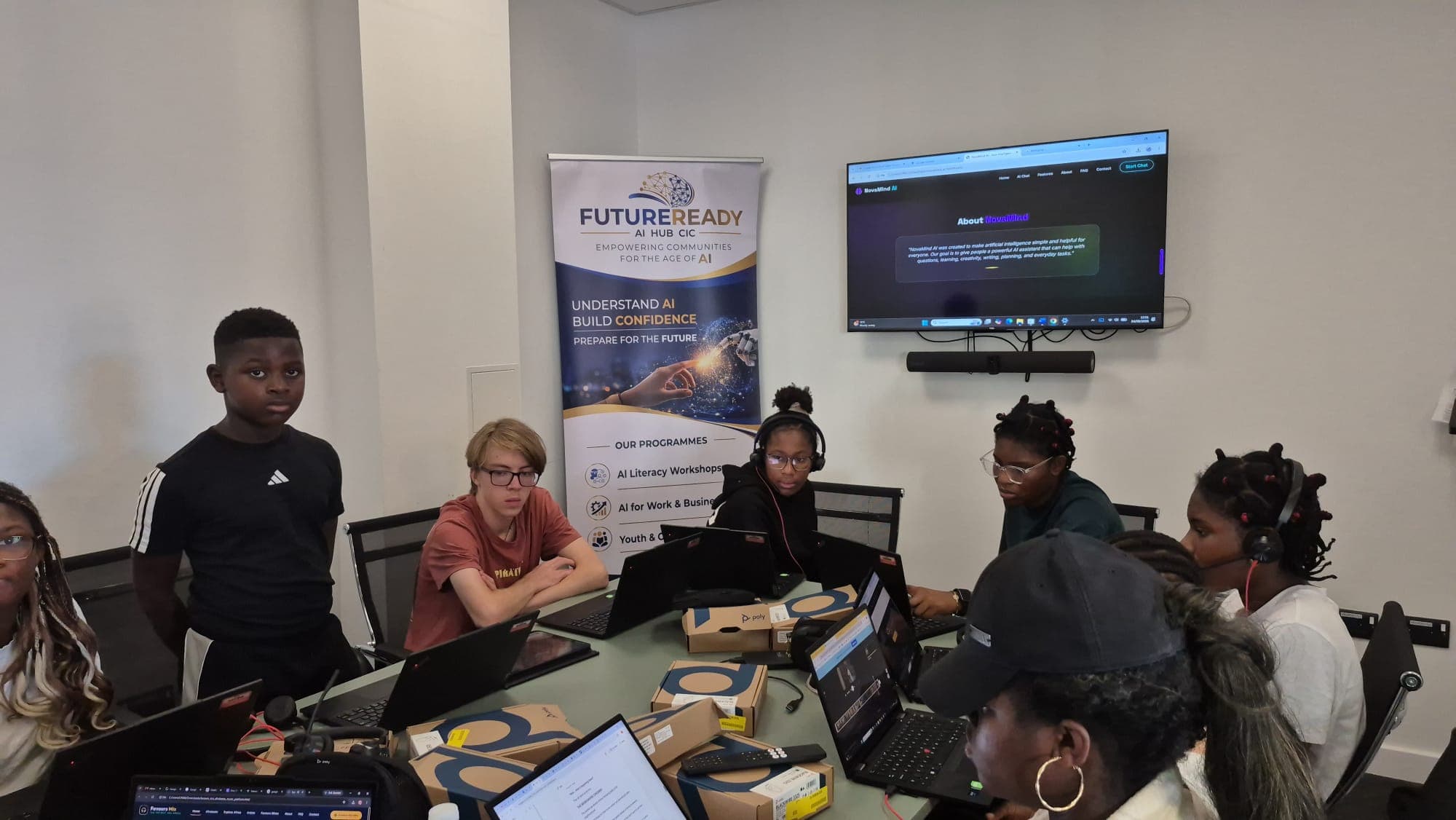 A participant presenting their project to the group during a workshop session